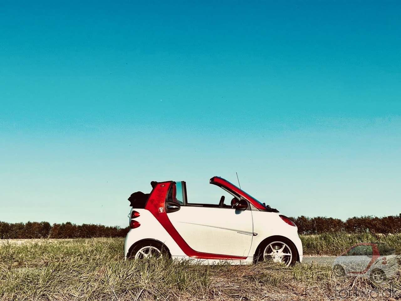 My Smart Fortwo under a blue sky