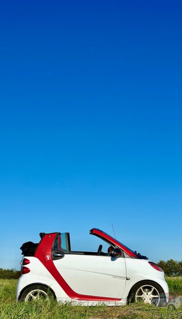 My Smart Fortwo under a blue sky