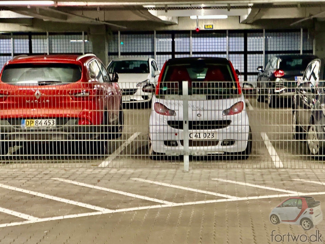 My Smart Fortwo cabriolet waits for me to return to the airport