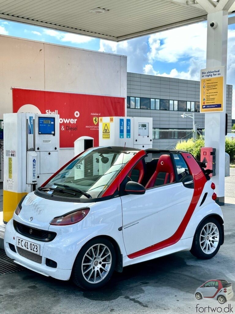 My Smart Fortwo with it's top down, at one of Shells Gas To Liquid Fuel pumps, refuelling with GTL Diesel