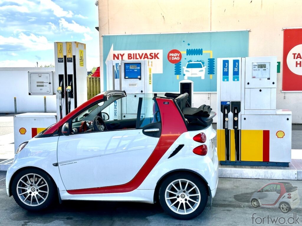 My Smart Fortwo with it's top down, at one of Shells Gas To Liquid Fuel pumps, refuelling with GTL Diesel